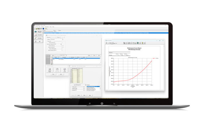 A laptop displaying multiple software windows, including a data entry form, a file directory, and a graph chart.