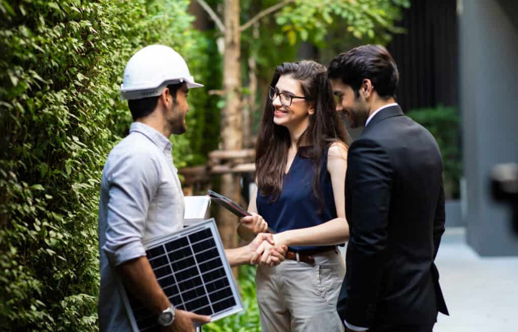 three people talking