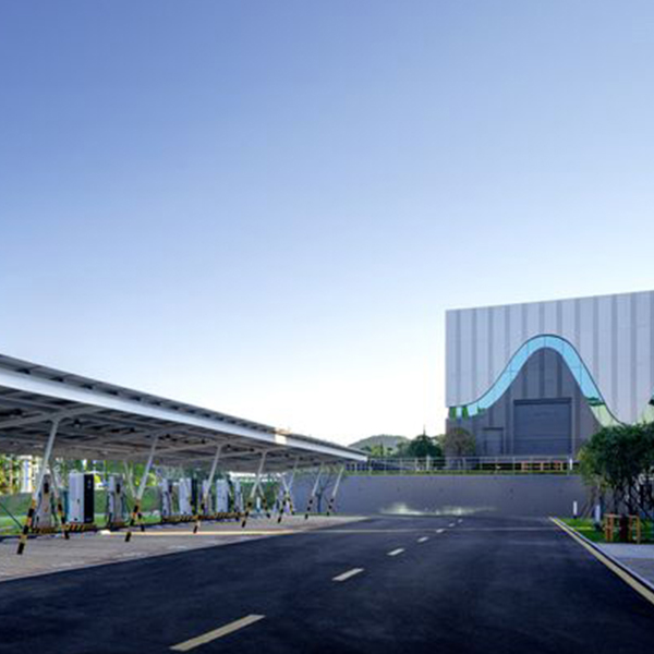 An artist's rendering of a parking lot with a building in the background.