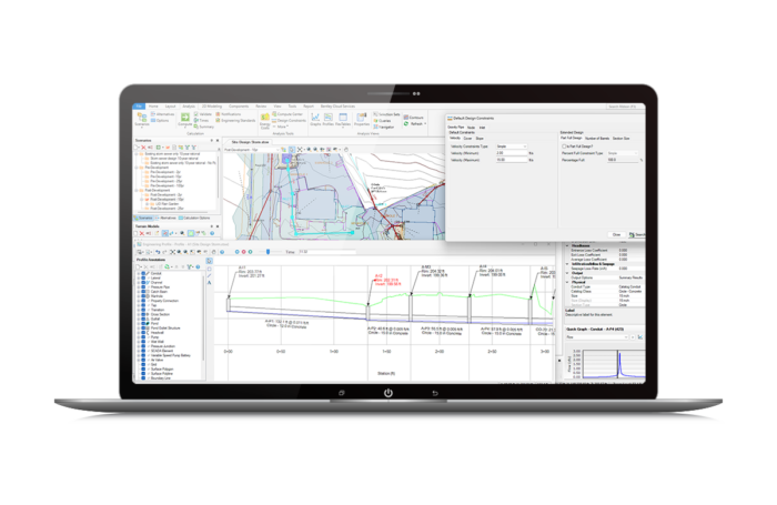 A laptop displaying a detailed software interface with charts, graphs, and various tools for data analysis and visualization.